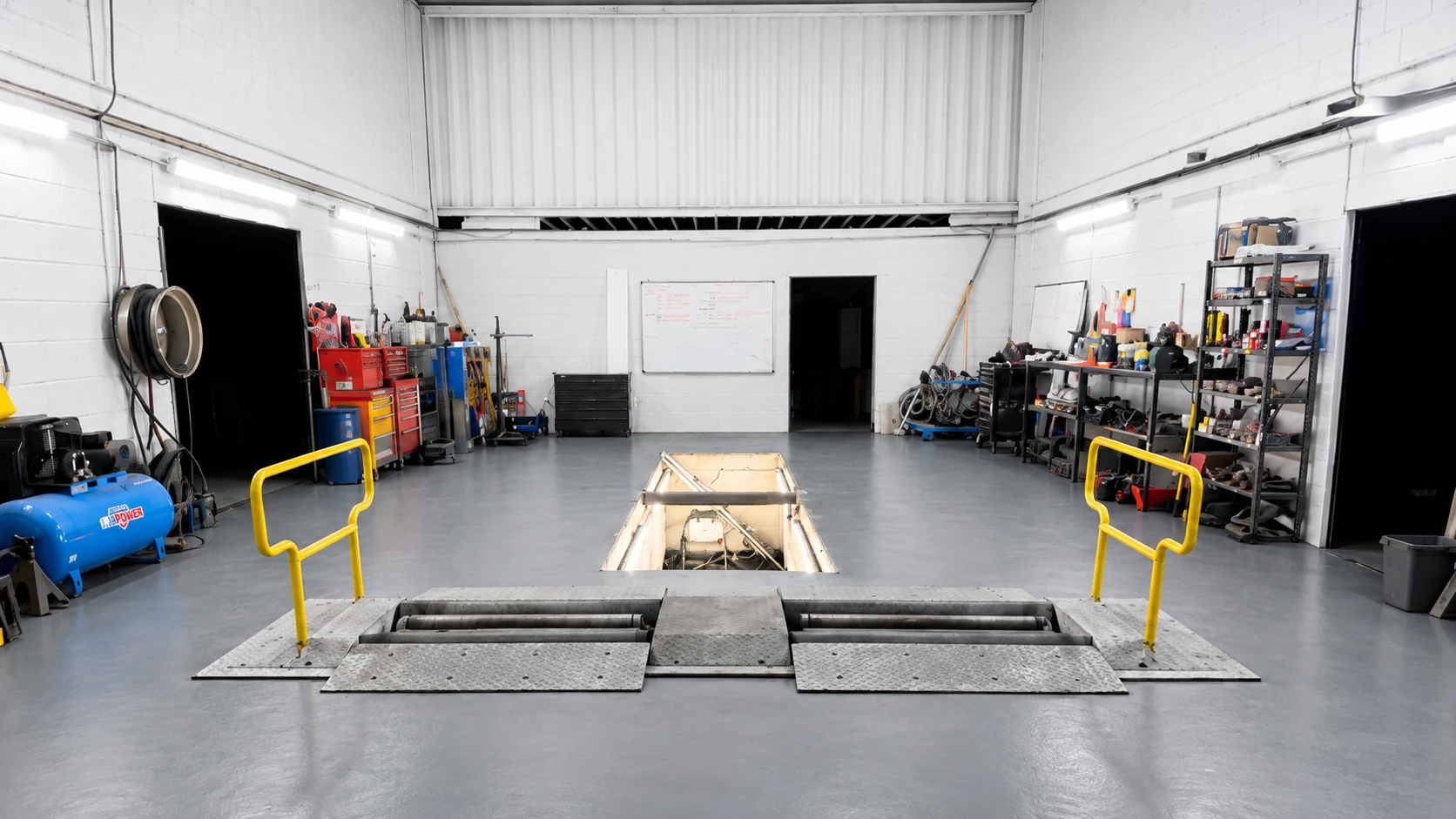 McKinney HGV workshop with inspection pit and roller brake tester
